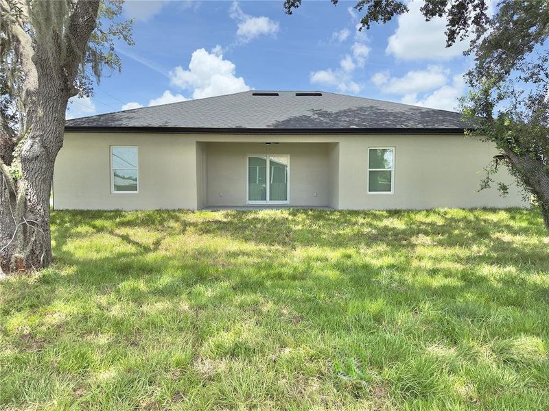Front exterior of a new home in , Port Charlotte, FL, highlighting curb appeal (Image 23).