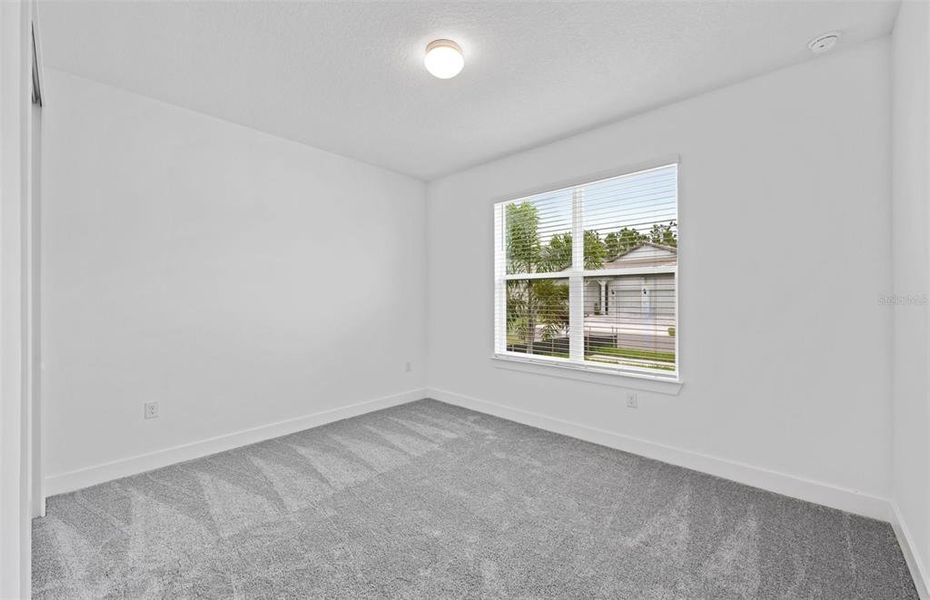 Spacious, unfurnished interior of a new home in Riverwood, Zephyrhills (Image 14).