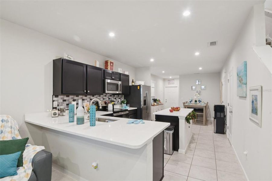 Furnished interior view inside a new home in Anclote Square, Holiday (Image 13).