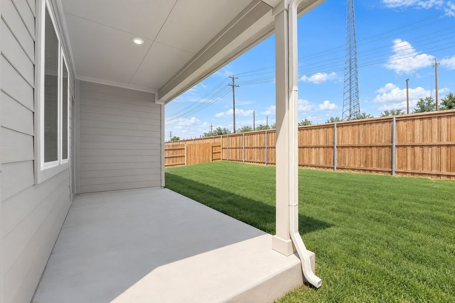 Exterior details and patio area of a home in Sunfield, Buda (Image 25).