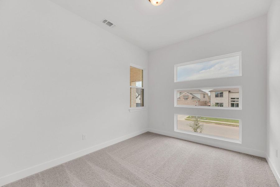 Spacious, unfurnished interior of a new home in Santa Rita Ranch - 60', Liberty Hill (Image 25). Spacious, unfurnished interior of a new home in Santa Rita Ranch - 60', Liberty Hill (Image 25).