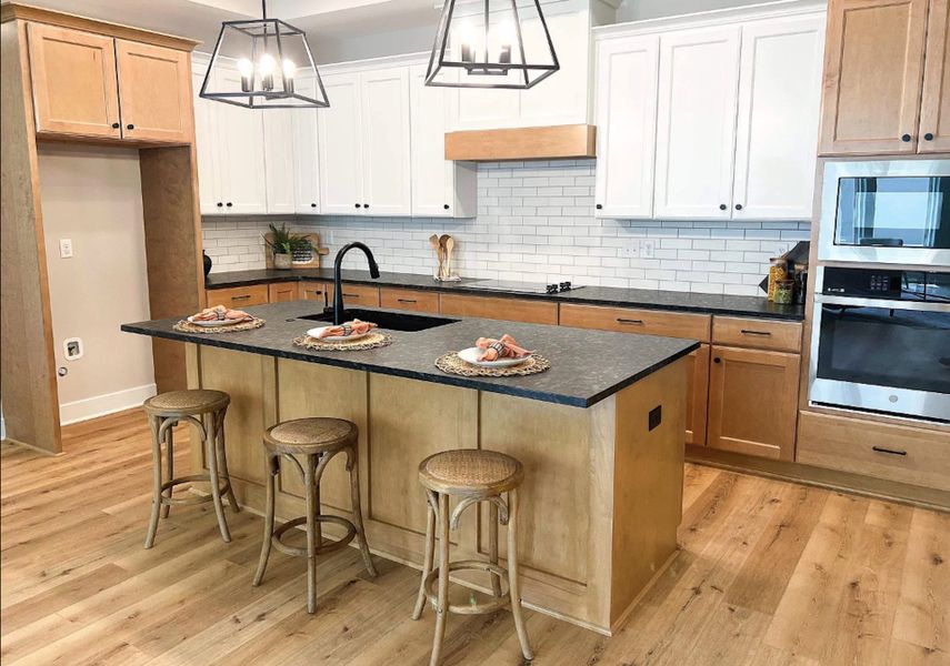 Representative furnished interior of a home built from the Promenade by Perfection Builders in The Courtyards at The Heritage, Andover (Image 4).