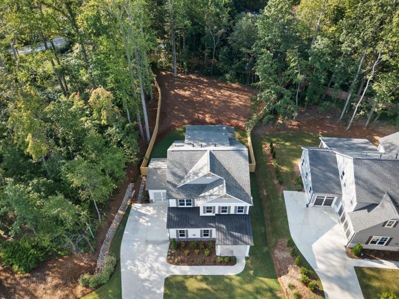 Front exterior of a new home in Arden on Lanier, Cumming, GA, highlighting curb appeal (Image 17).