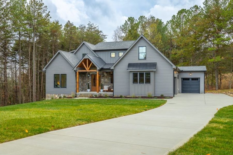Front exterior of a new home in River Gorge Ranch, Guild, TN, highlighting curb appeal (Image 36).
