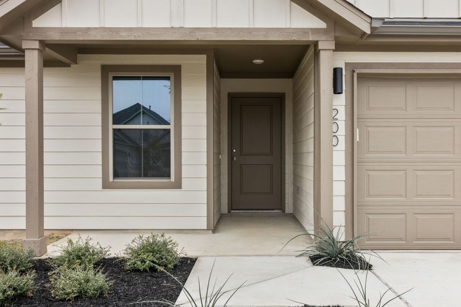 Exterior details and patio area of a home in Trinity Ranch, Elgin (Image 3).