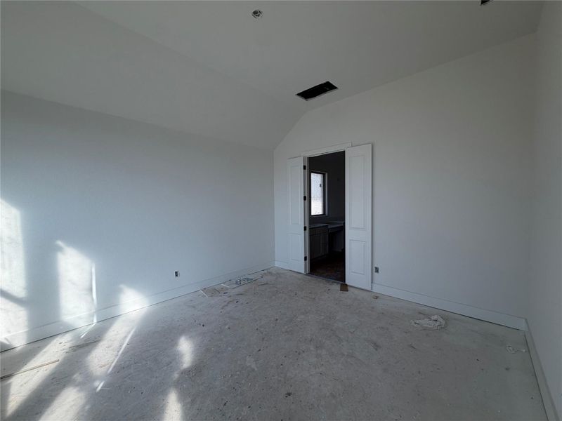 Primary Bedroom with elevated ceiling Primary Bedroom with elevated ceiling