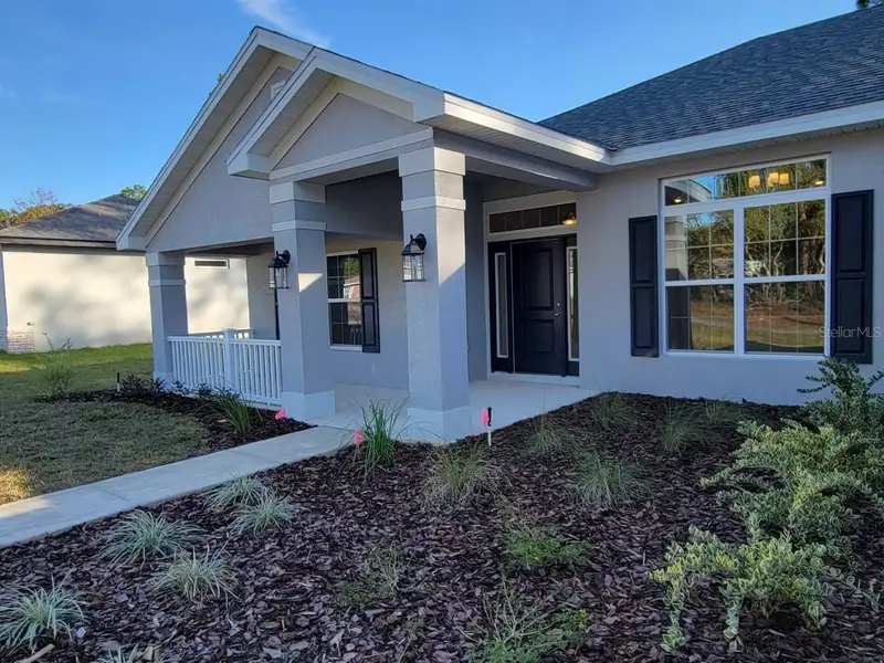 Exterior details and patio area of a home in Marion Oaks, Ocala (Image 2). Exterior details and patio area of a home in Marion Oaks, Ocala (Image 2).