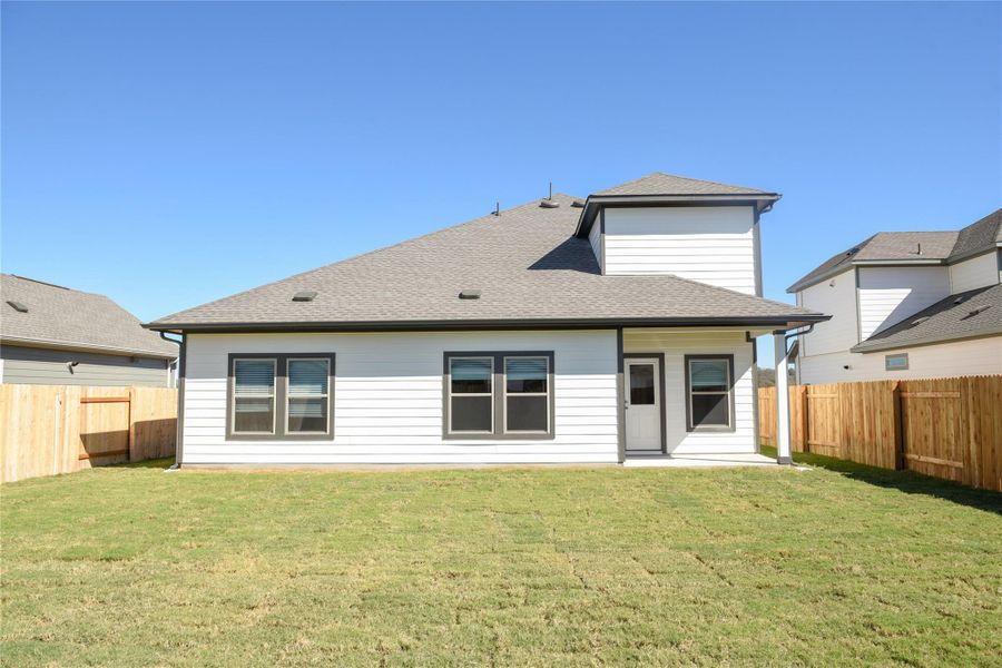 Rear of Home and Private Backyard