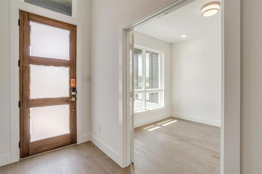 Foyer featuring light hardwood / wood-style flooring