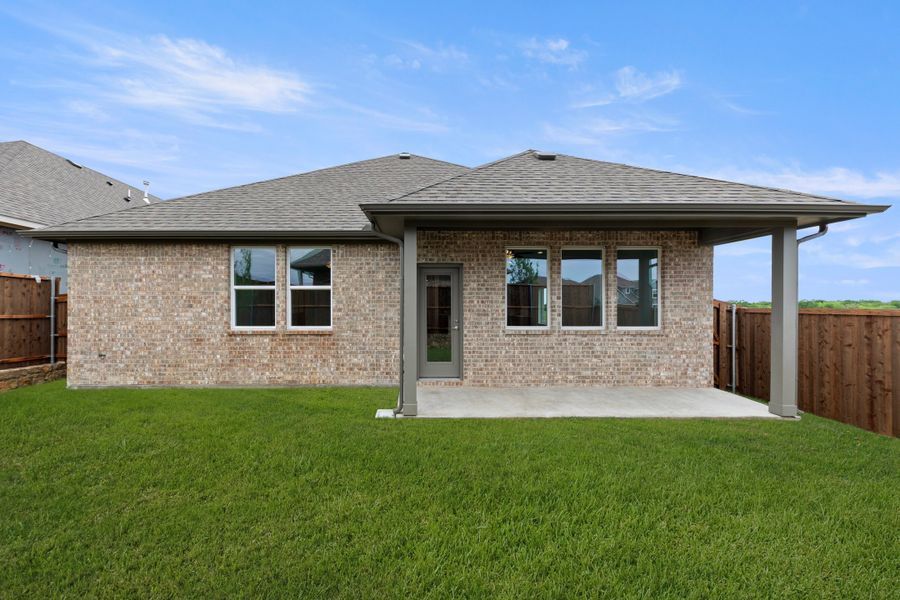 Exterior details and patio area of a home in Creekside, Royse City (Image 2).