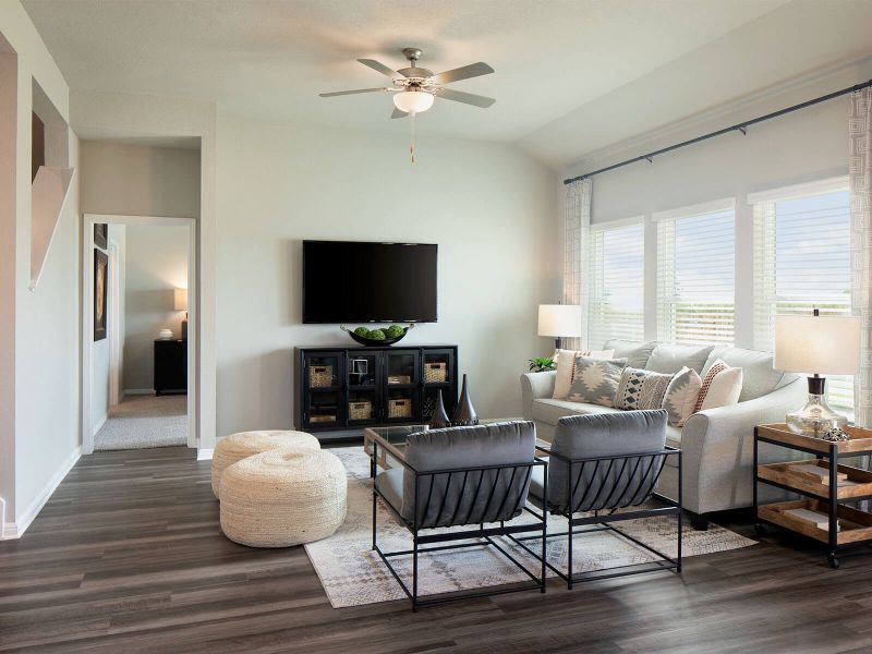 The family room is spacious and comfortable for spending time with family and friends.