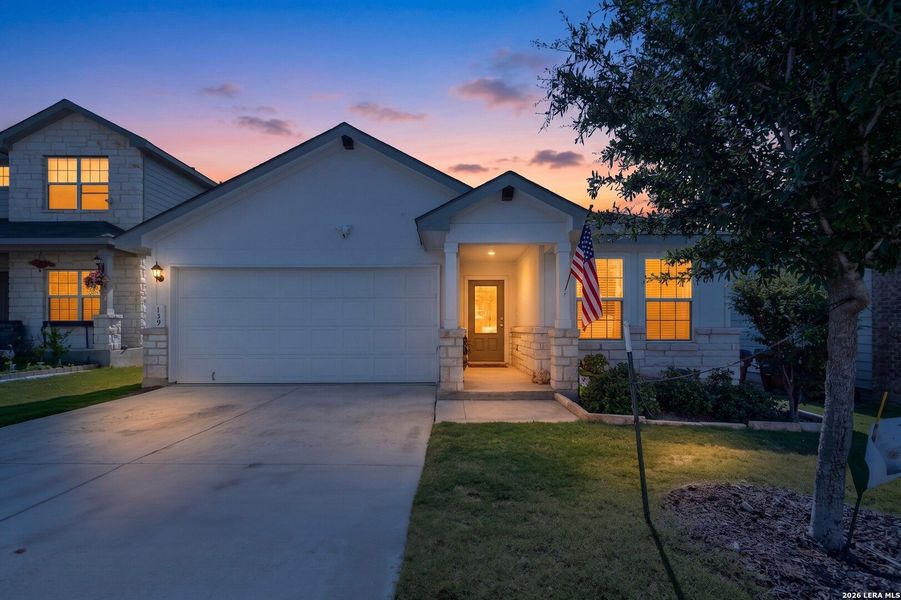Front exterior of a new home in Redbird Ranch, San Antonio, TX, highlighting curb appeal (Image 2). Front exterior of a new home in Redbird Ranch, San Antonio, TX, highlighting curb appeal (Image 2).