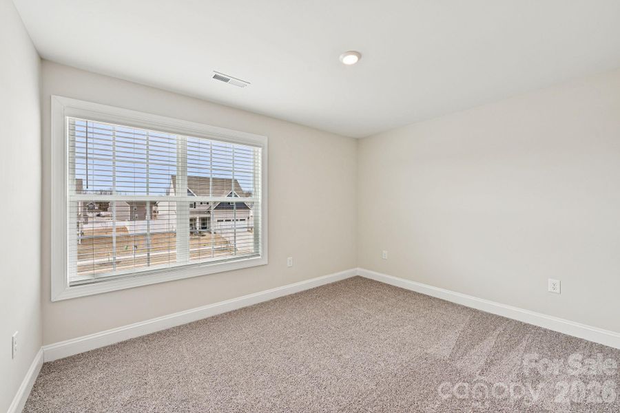 Spacious, unfurnished interior of a new home in Colonial Crossing, Troutman (Image 19).