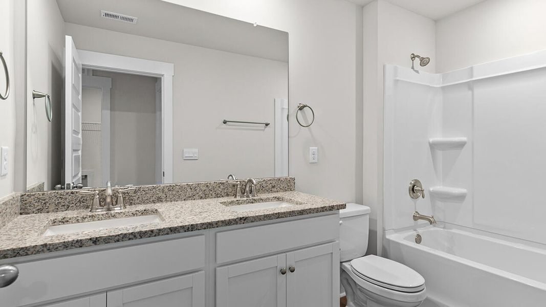 Furnished interior view inside a new home in The Haven at Indigo Preserve, Leland (Image 14).