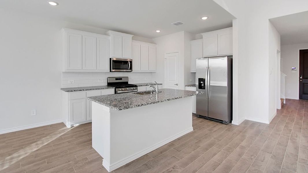 Furnished interior view inside a new home in Prairie Oaks, Oak Point (Image 4).