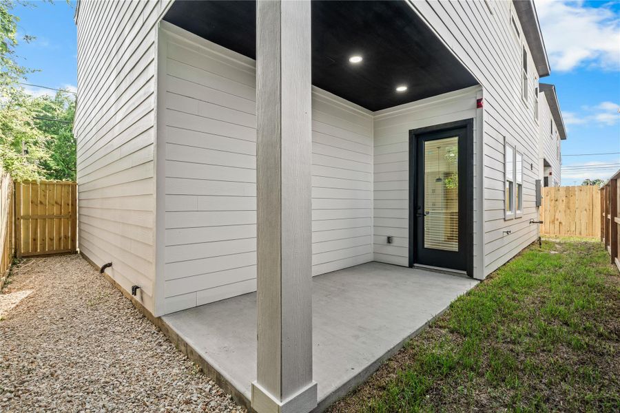 Low-maintenance luxury. The fenced-in yard offers the ideal blend of green grass and clean gravel pathways, giving you a secure pet-friendly space without endless weekend yard work.