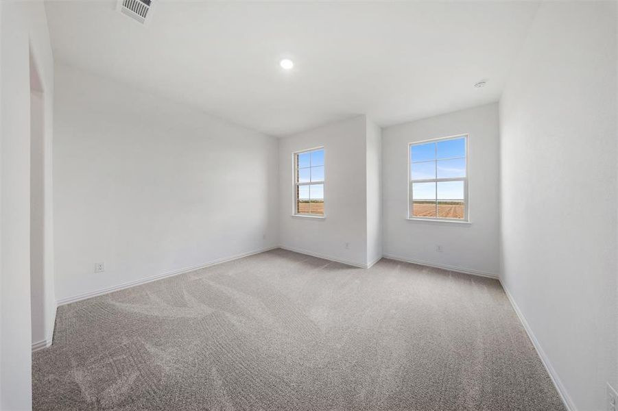 Empty room with carpet and recessed lighting Empty room with carpet and recessed lighting
