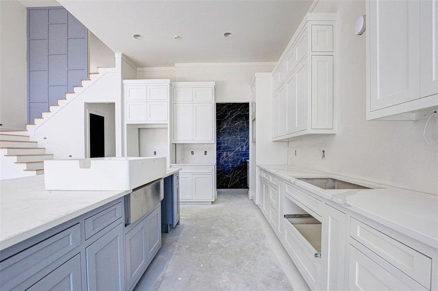 Unfurnished bedroom featuring a high ceiling