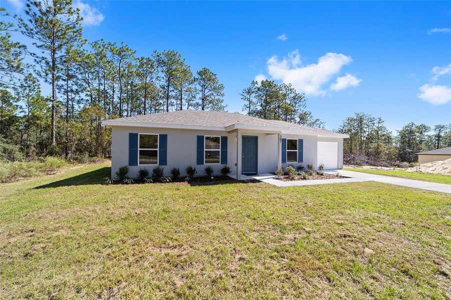 Front exterior of a new home in , Dunnellon, FL, highlighting curb appeal (Image 23). Front exterior of a new home in , Dunnellon, FL, highlighting curb appeal (Image 23).
