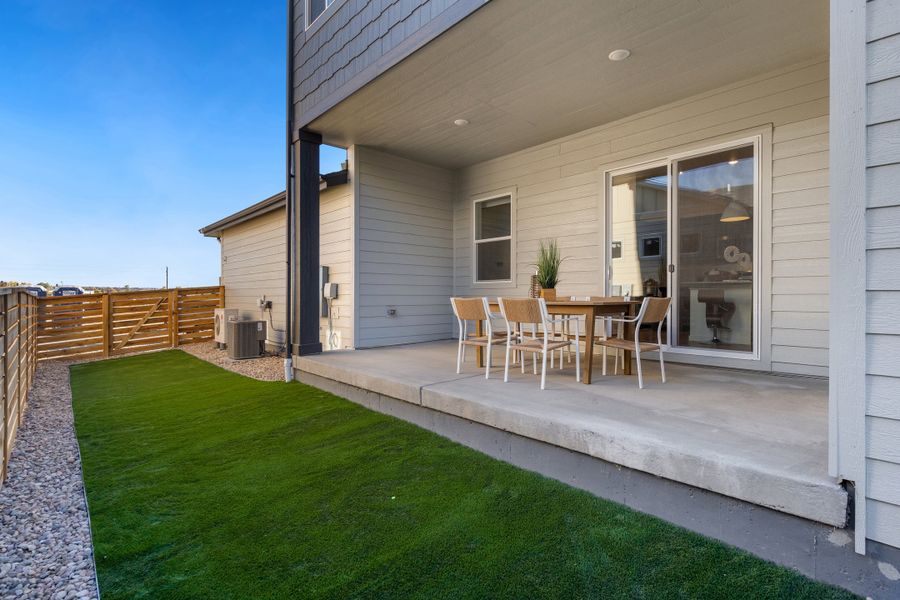 Front exterior of a new home in Trailside on Harmony, Timnath, CO, highlighting curb appeal (Image 29).
