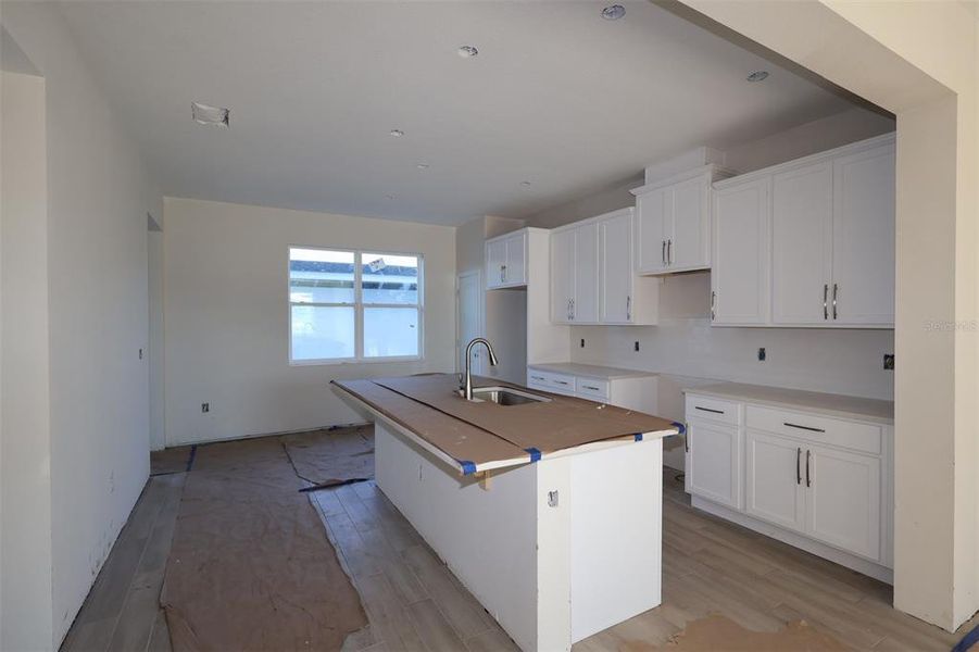 In-progress construction of a new home in Center Lake on the Park, St. Cloud, FL (Image 20).