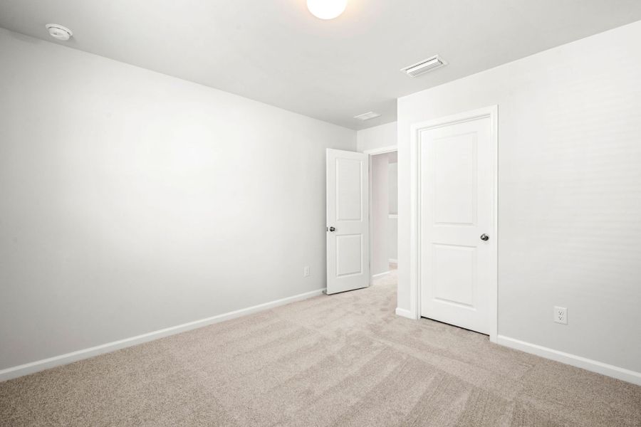Spacious, unfurnished interior of a new home in Heartwood, Richmond Hill (Image 21).