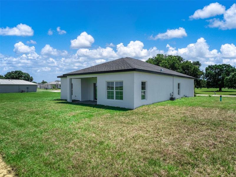 Exterior details and patio area of a home in , Sebring (Image 4).
