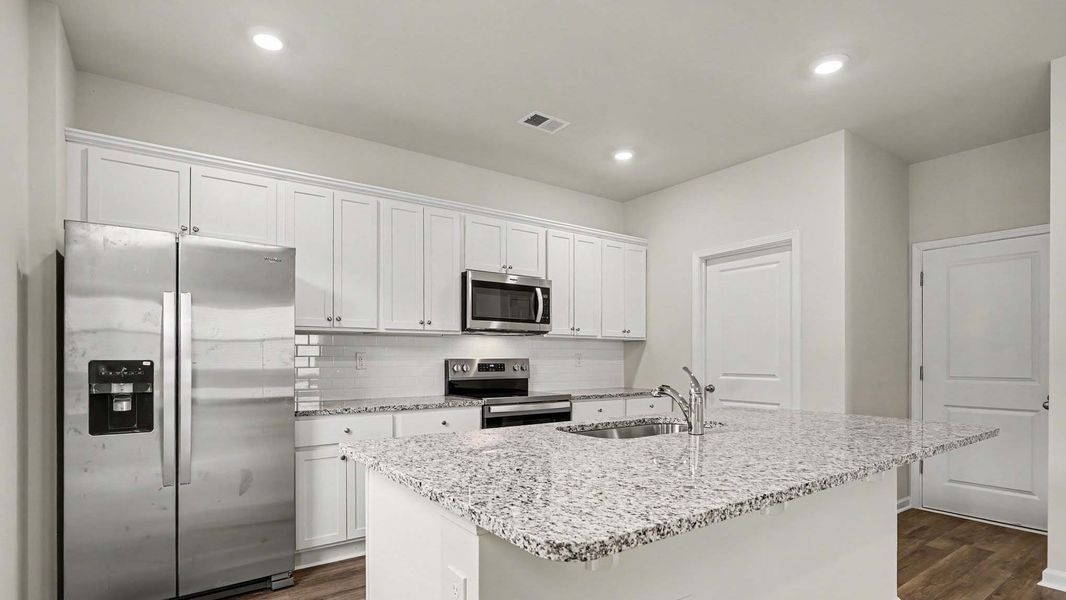 Furnished interior view inside a new home in Sandridge Park, Little River (Image 5).