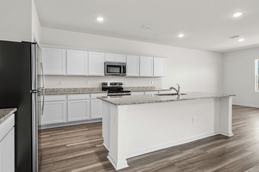 Representative furnished interior of a home built from the Europa by Starlight Homes in Andalusia, Loris (Image 9).