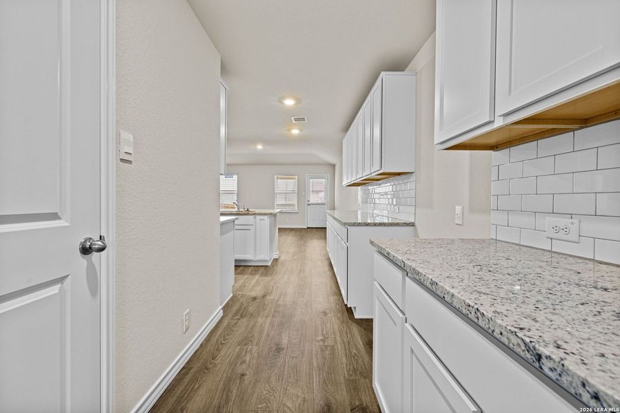 Furnished interior view inside a new home in Redbird Ranch, San Antonio (Image 11).