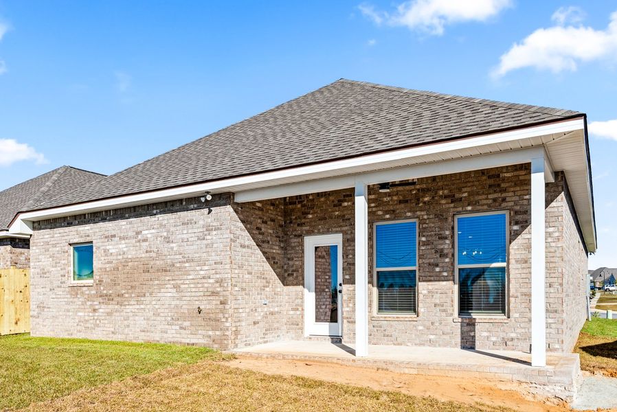 Exterior details and patio area of a home in The Bluffs at Lafayette, Freeport (Image 3).