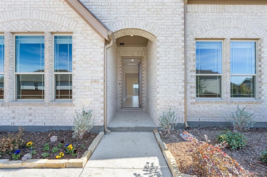 Exterior details and patio area of a home in Sonoma Verde, McLendon-Chisholm (Image 21).