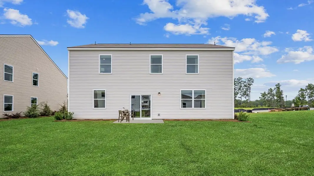 Front exterior of a new home in The Retreat at East Argent, Ridgeland, SC, highlighting curb appeal (Image 22).