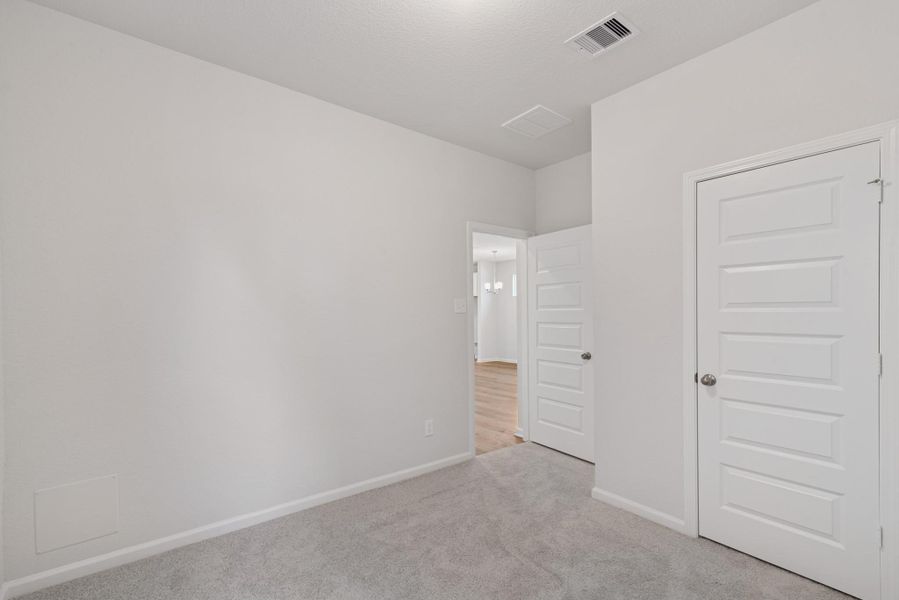 The Blue Jay II- Bedroom 2. Home under construction. Sample floor plan photo used for illustrative purposes only. Upgrades, selections options, and colors will vary. The Blue Jay II- Bedroom 2. Home under construction. Sample floor plan photo used for illustrative purposes only. Upgrades, selections options, and colors will vary.