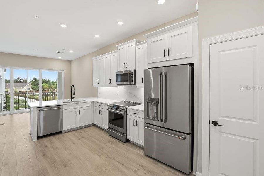 Furnished interior view inside a new home in Seahaven, Punta Gorda (Image 7). Furnished interior view inside a new home in Seahaven, Punta Gorda (Image 7).