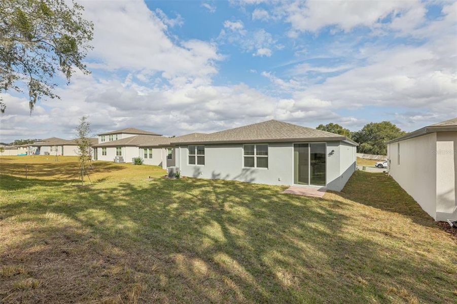 Exterior details and patio area of a home in Deer Run at Crosswinds, Davenport (Image 3). Exterior details and patio area of a home in Deer Run at Crosswinds, Davenport (Image 3).