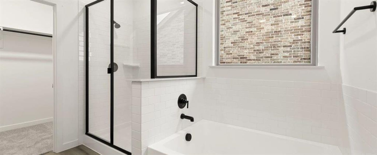 Primary Bathroom featuring a garden tub Primary Bathroom featuring a garden tub