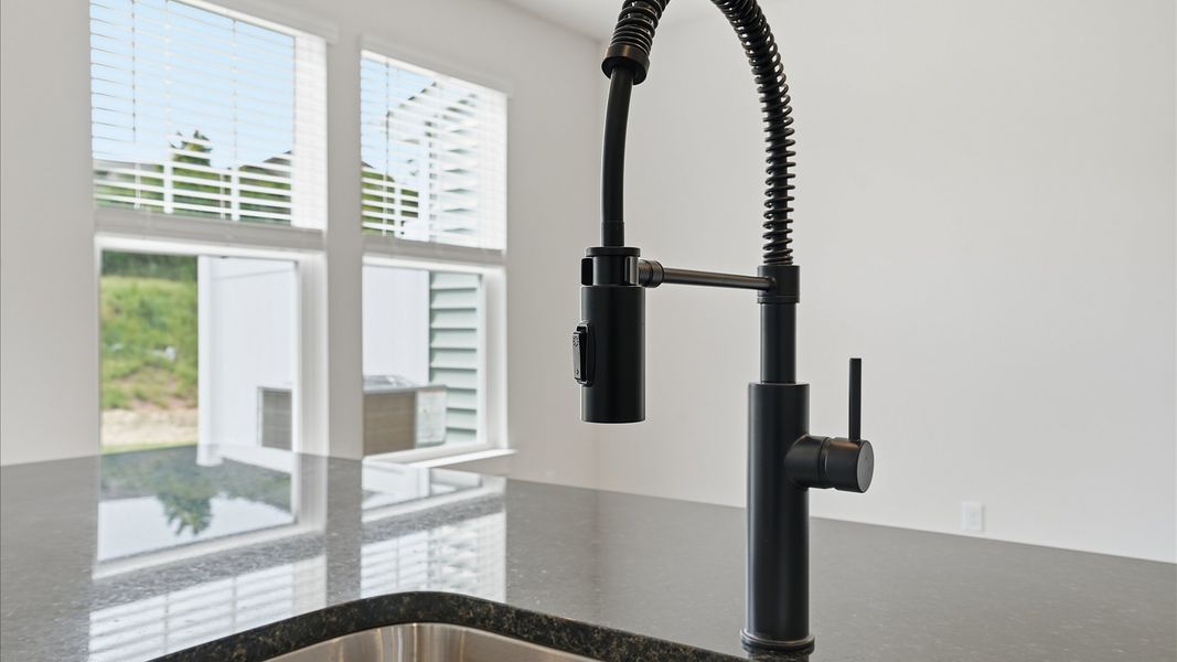 Beautifully appointed kitchen with spacious counters and sophisticated detailing at Marion Square Beautifully appointed kitchen with spacious counters and sophisticated detailing at Marion Square