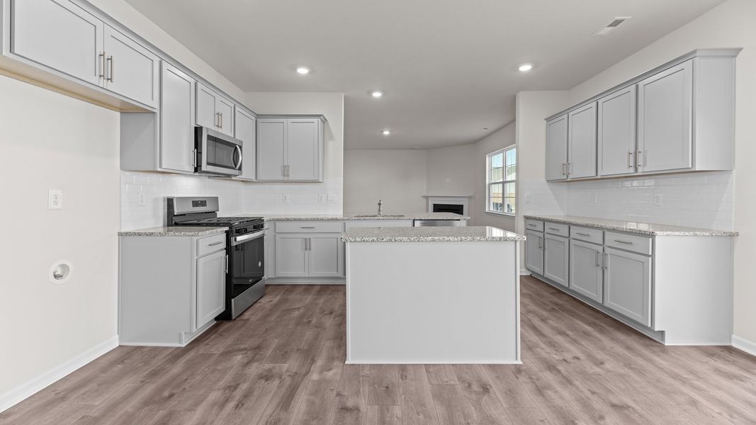 Furnished interior view inside a new home in East Ridge, Ayden (Image 6).