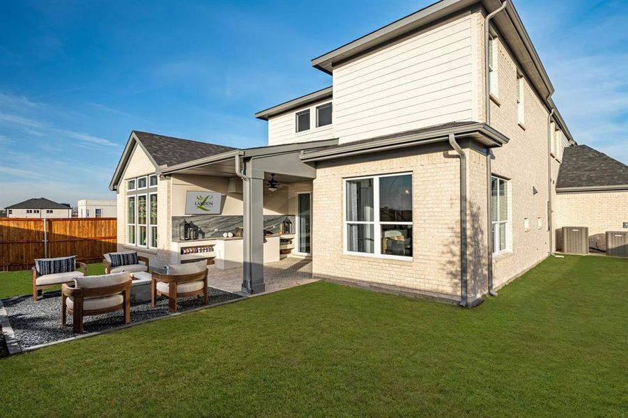 Exterior details and patio area of a home in East Village - Classic Series, Frisco (Image 3).