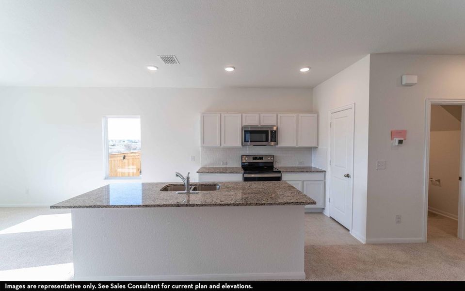Furnished interior view inside a new home in Caney Mills, Conroe (Image 2).