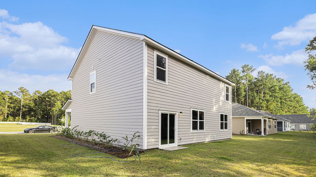 Exterior details and patio area of a home in Auberon Woods, Conway (Image 4).