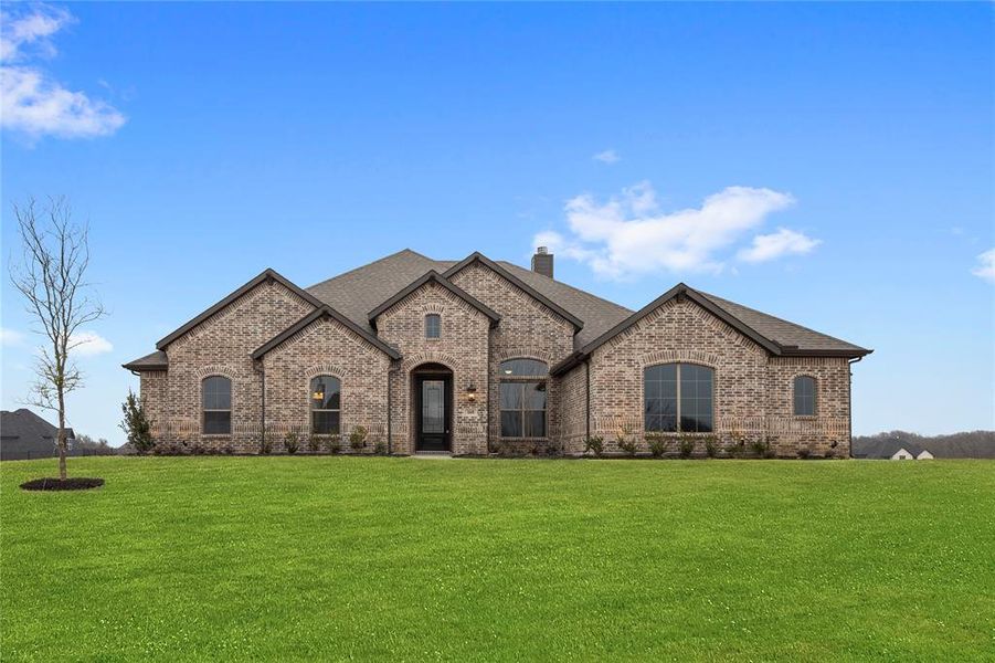 Front exterior of a new home in The Meadows, Gunter, TX, highlighting curb appeal (Image 22).