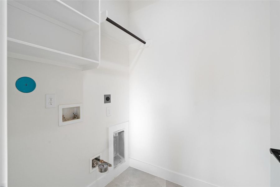 The oversized utility room offers ample space for laundry, storage, and organization, making household tasks effortless. Its generous layout allows for functionality without sacrificing style, complementing the home’s modern farmhouse design. This practical yet thoughtfully designed space adds convenience to everyday living. The oversized utility room offers ample space for laundry, storage, and organization, making household tasks effortless. Its generous layout allows for functionality without sacrificing style, complementing the home’s modern farmhouse design. This practical yet thoughtfully designed space adds convenience to everyday living.