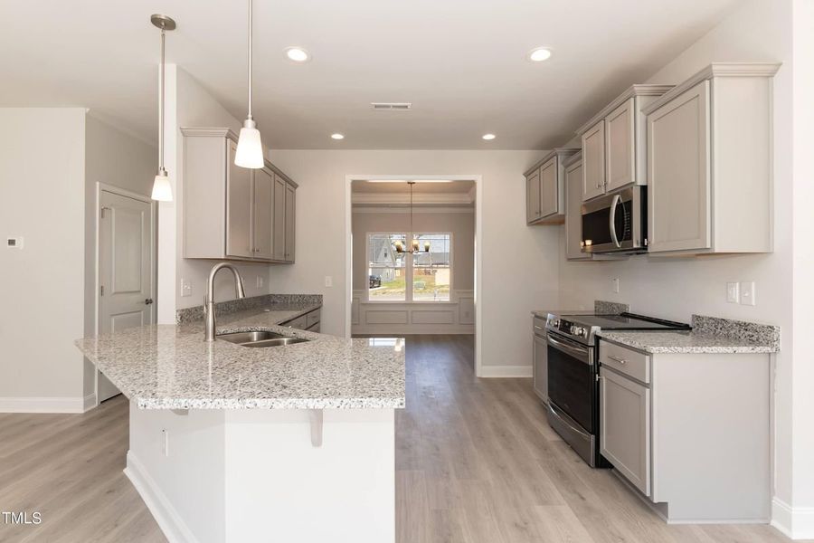 Representative furnished interior of a home built from the 2721 by Adams Homes in Hidden Pines, Cameron (Image 5).