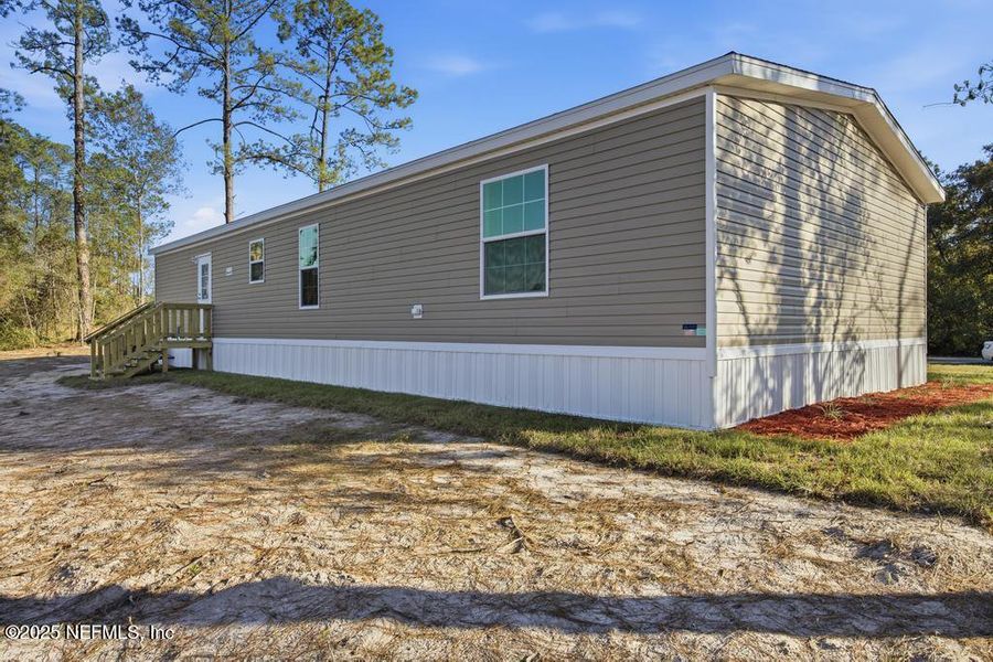 Exterior details and patio area of a home in , Interlachen (Image 25).