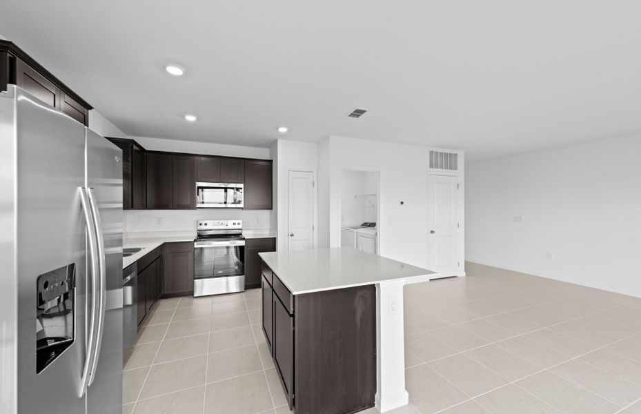Furnished interior view inside a new home in Caloosa Cove, Labelle (Image 7).