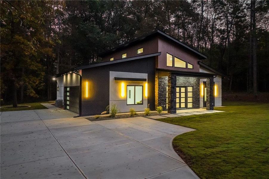 Front exterior of a new home in , Winder, GA, highlighting curb appeal (Image 30). Front exterior of a new home in , Winder, GA, highlighting curb appeal (Image 30).
