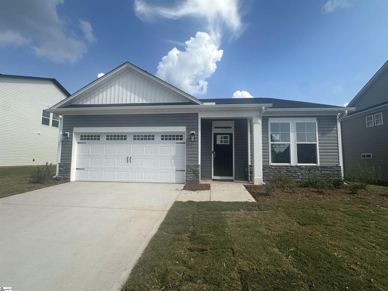 Front exterior of a new home in Shiloh Trail, Wellford, SC, highlighting curb appeal (Image 1).