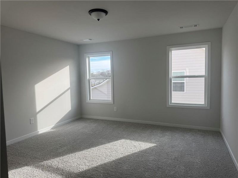 Spacious, unfurnished interior of a new home in Rosewood Lake Preserve, Hoschton (Image 22).